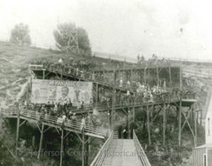 historical image of a wooden stairway connecting two parts of town